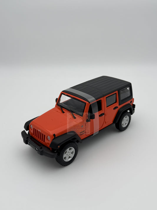 Macheta auto JEEP WRANGLER UNLIMITED ORANGE 1/24 MAISTO